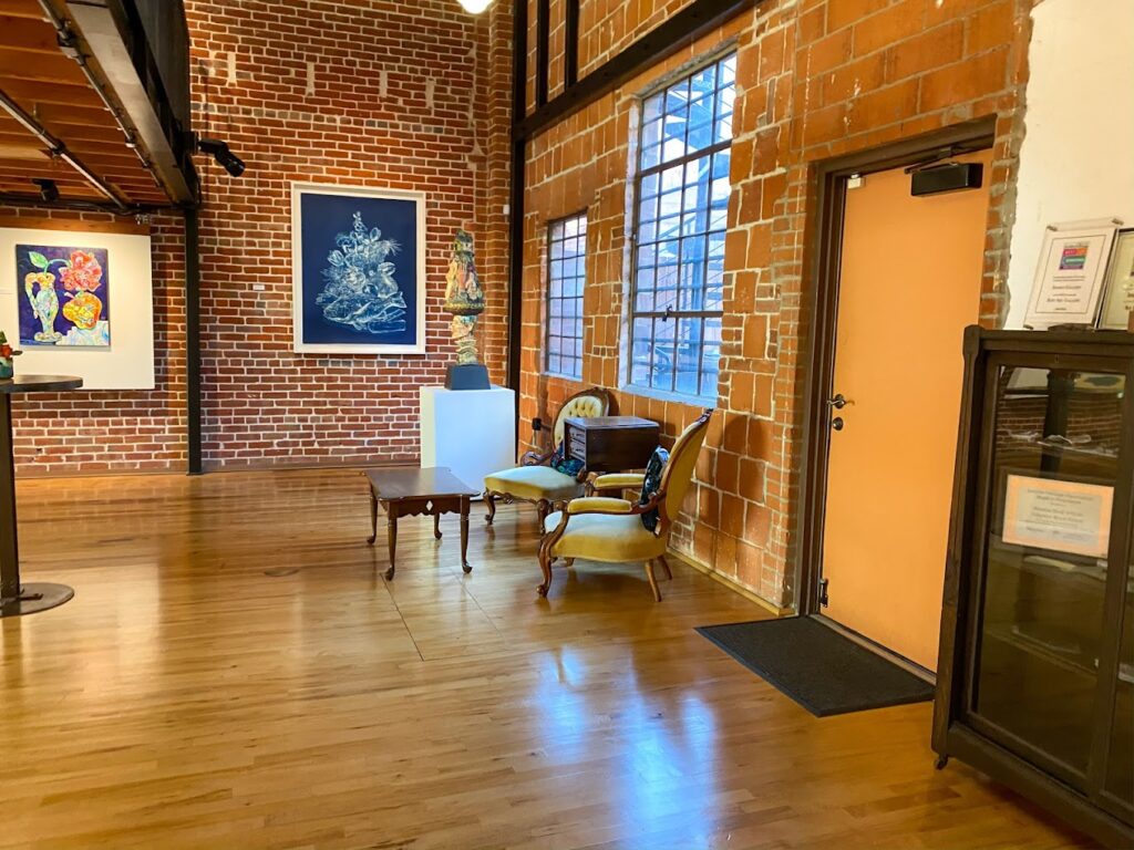 a living room with a wooden floor